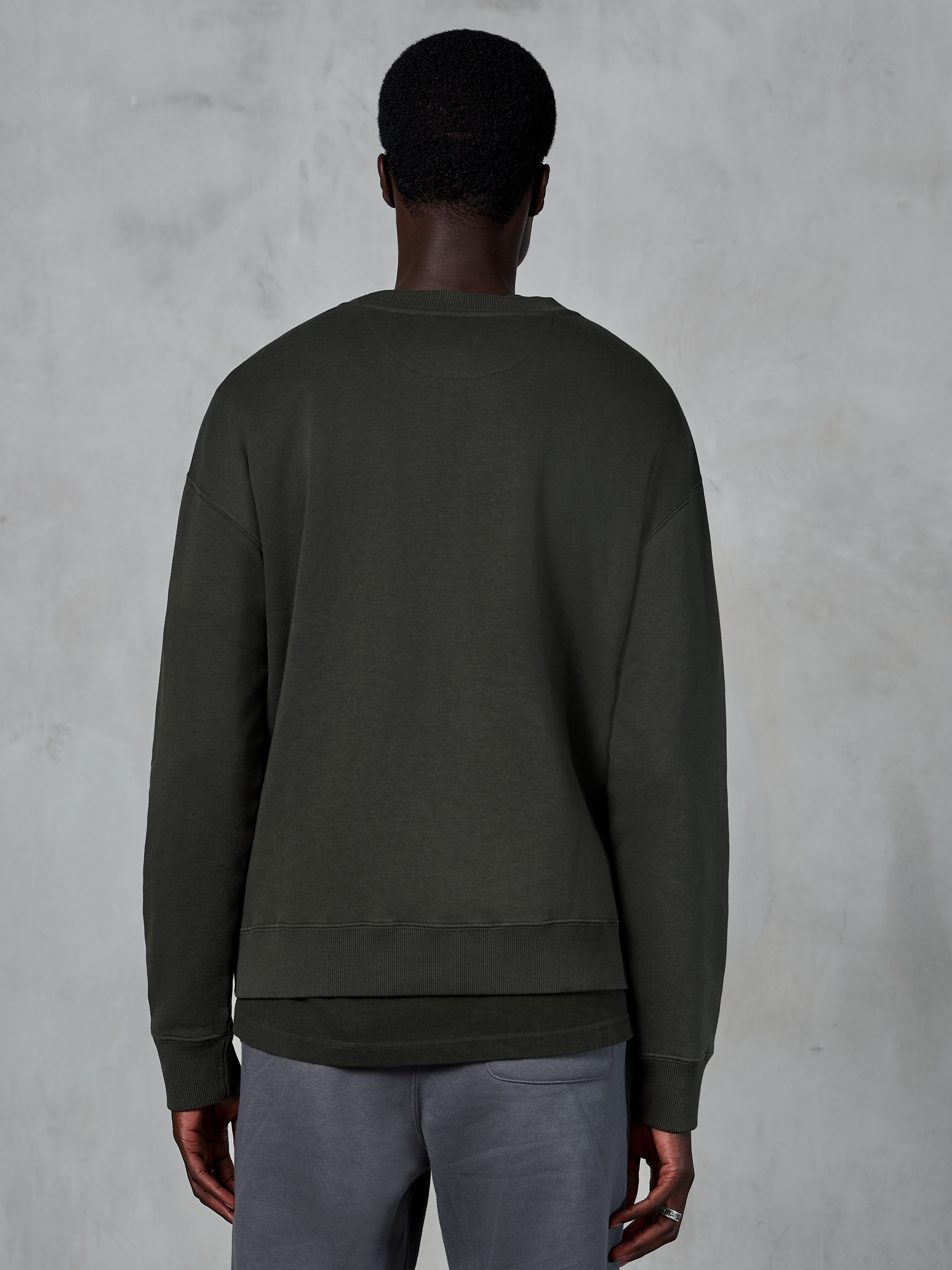 Alpinestars Essentials Ageless Crew, Premium Crewneck Sweatshirt, Off Black, rear view, casual lifestyle apparel featuring a relaxed fit, ribbed cuffs and hem.