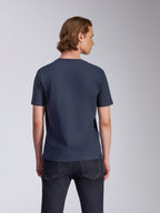 Alpinestars Fasting CSF Tee, Short Sleeve T-Shirt, Navy Blue, back view, worn by model with dark jeans, casual motorsport-inspired streetwear