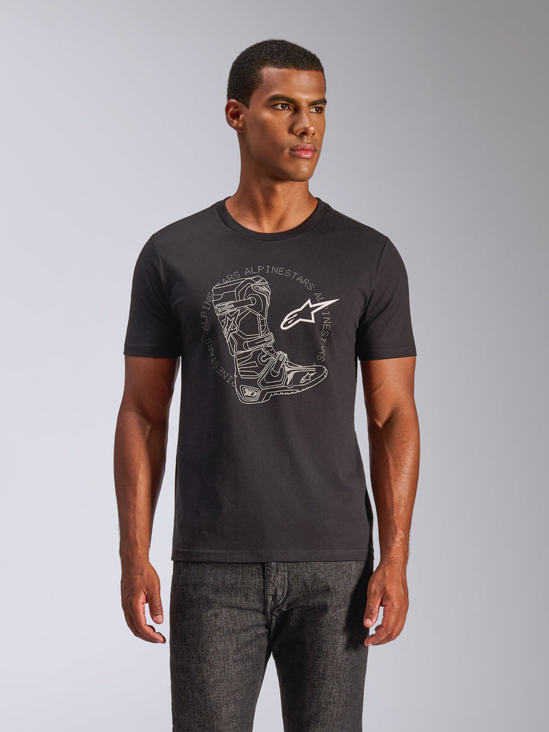 Alpinestars Tech Boot CSF Tee, Short Sleeve T-Shirt, Black, White Motocross Boot Graphic and Star Logo, Casual Motorsport Streetwear, worn by male model