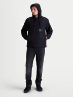 Alpinestars Speeder Resolve Windbreaker Jacket, Men's Lightweight Sportswear for Urban Use, Black, 100% Polyester, featuring an adjustable hood, mesh-lined interior, and signature Alpinestars chest branding. Full-length on-model view showing the windproof hooded jacket styled for casual everyday wear.