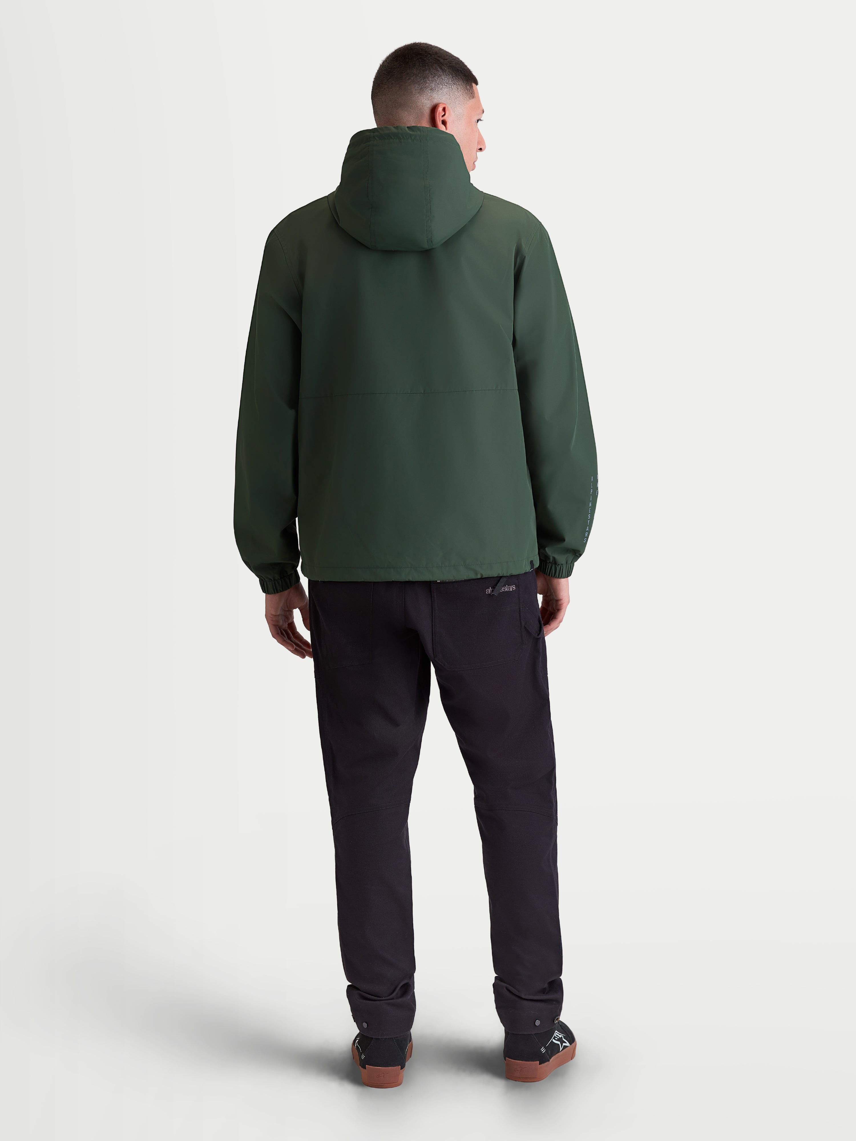 Alpinestars Speeder Resolve Windbreaker Jacket, Men's Lightweight Sportswear Hooded Shell in Pine Green, Windproof Textile Design, Back View showing hood and elastic cuffs.