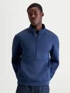 Alpinestars Apera Half-Zip Sweatshirt, Steel Blue Sportswear Pullover for Men and Women, Front View on Model, Tri-Blend Fleece with Kangaroo Pocket and Tonal Alpinestars Branding, Casual Motorsport-Inspired Apparel