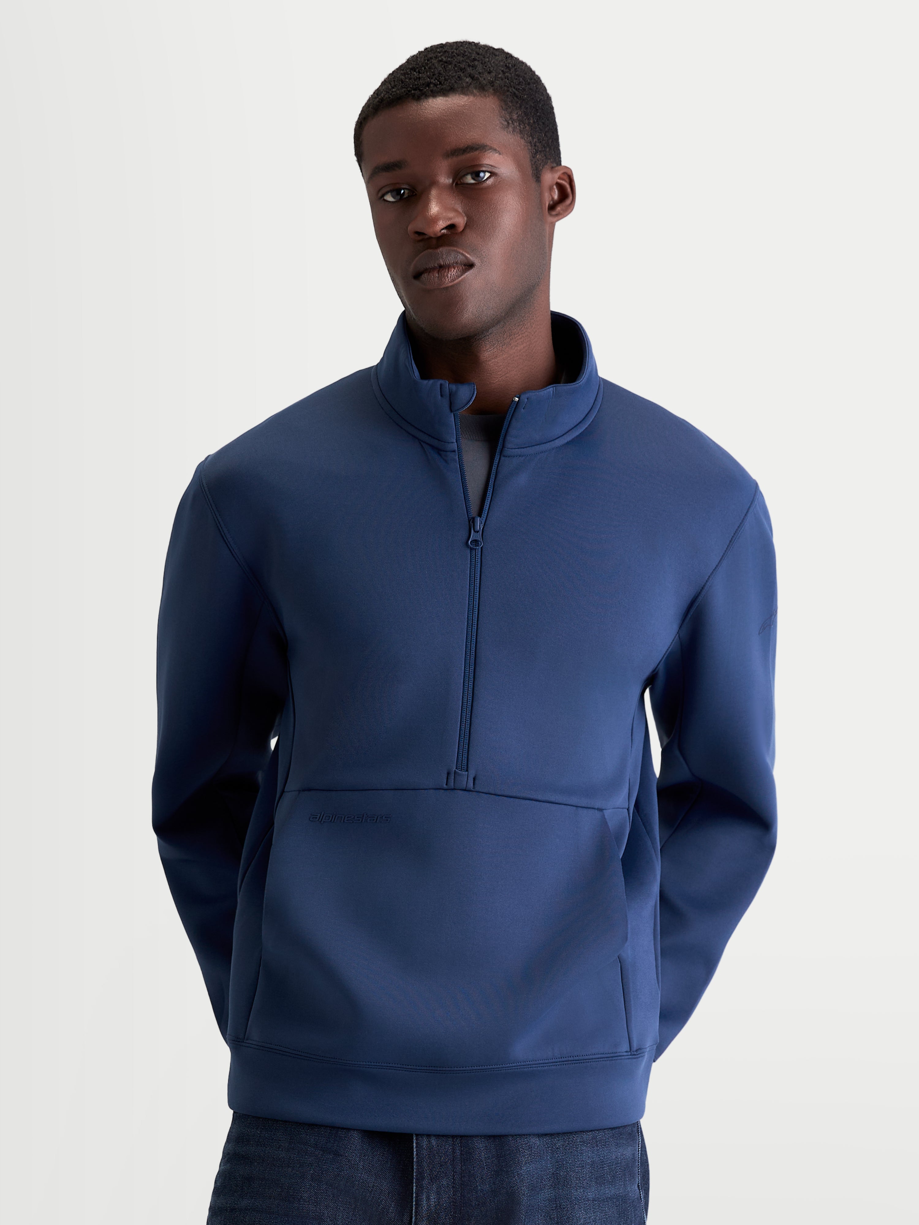 Alpinestars Apera Half-Zip Sweatshirt, Steel Blue Sportswear Pullover for Men and Women, Front View on Model, Tri-Blend Fleece with Kangaroo Pocket and Tonal Alpinestars Branding, Casual Motorsport-Inspired Apparel