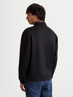 Alpinestars Apera Half-Zip Sweatshirt, Motorsport-Inspired Sportswear Pullover, Black, Premium tri-blend double-face fleece construction, Back view on model showing refined sleeve seaming and clean lifestyle fit.