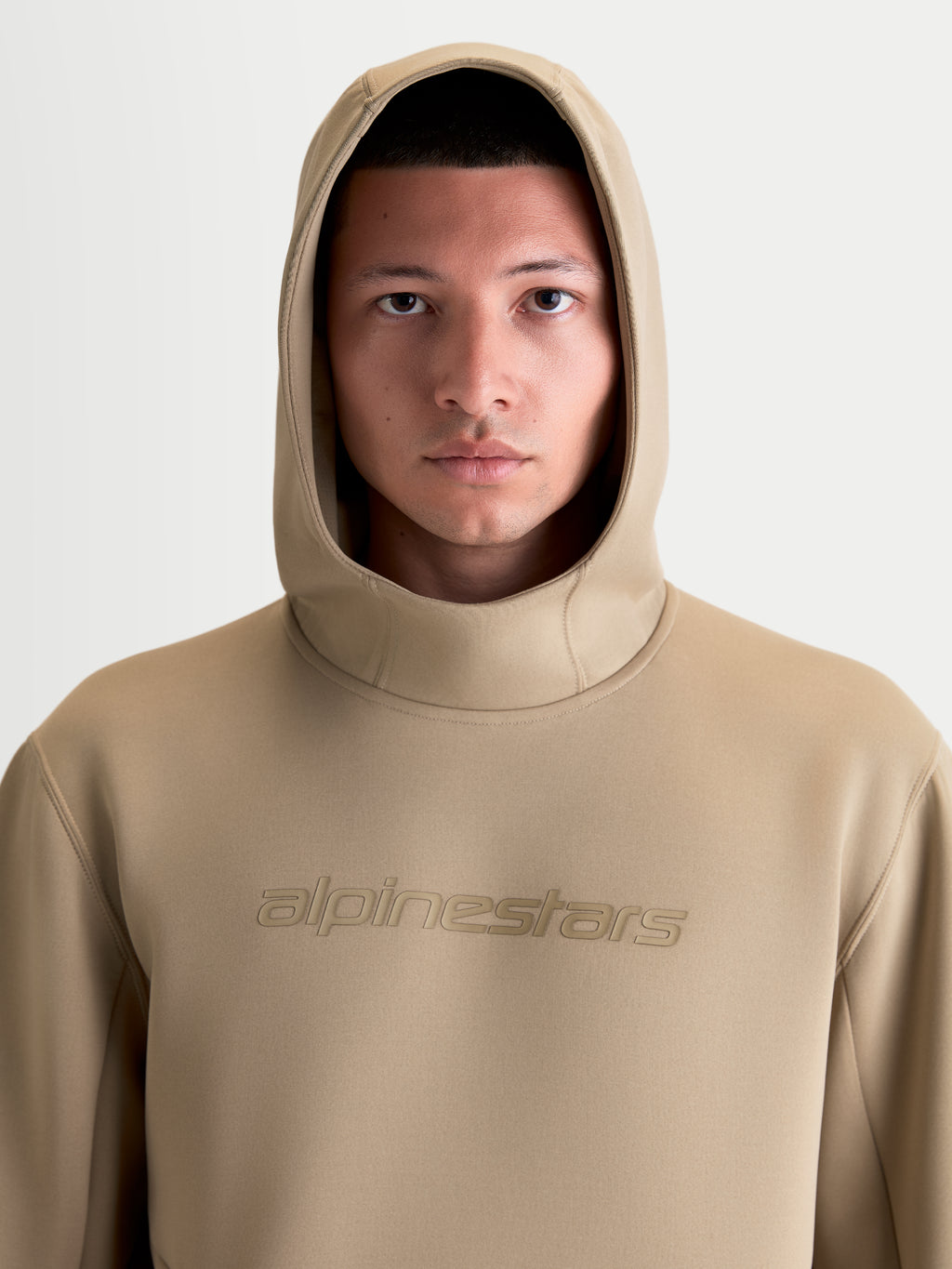 Alpinestars Datrix Hoodie, premium sportswear pullover hoodie for men, Putty Brown, featuring tonal HD Alpinestars branding on the chest and a hood, made from tri-blend double-face fleece for a clean motorsport-inspired style.