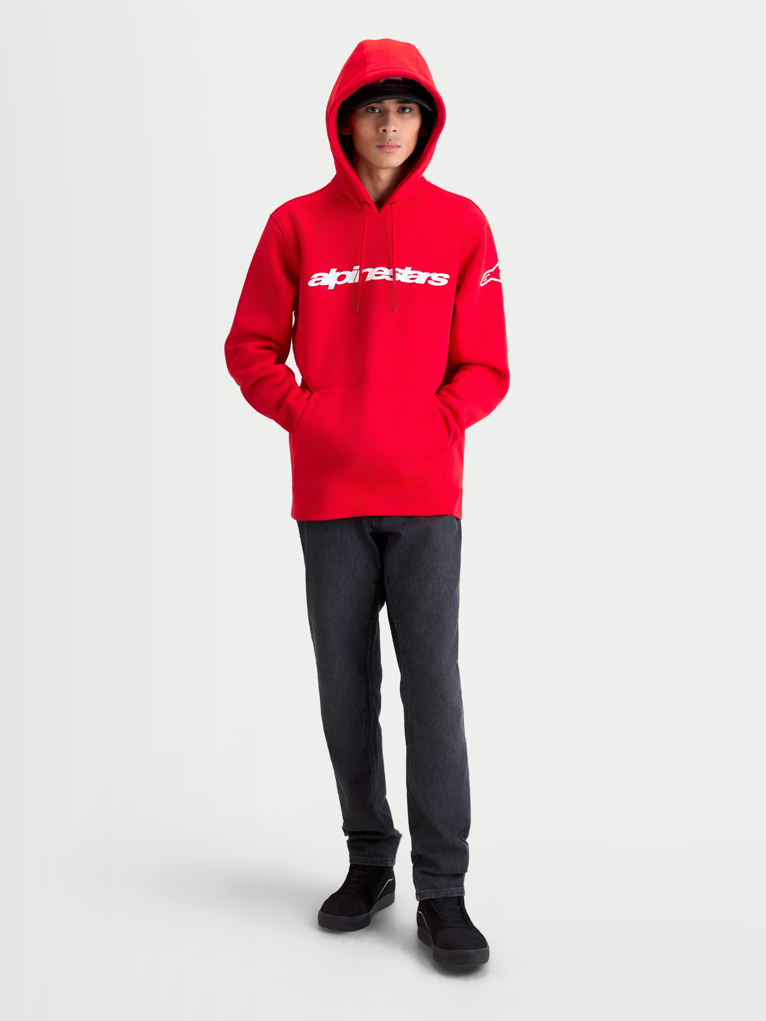 Alpinestars Race Wordmark Hoodie, Men's Sportswear Pullover Fleece, Red and White, features bold Alpinestars linear wordmark on chest and Ageless logo on sleeve, self-lined hood with drawstring, 80% cotton and 20% recycled polyester blend, motorsport-inspired casual wear.