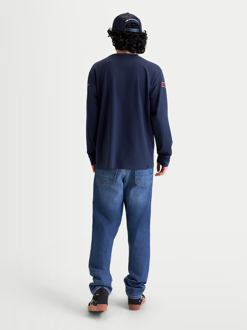 Alpinestars Velocifier CSF Tee, Long Sleeve Sportswear T-Shirt, Navy Blue, Back View on Model, featuring shoulder logo graphics and a soft cotton blend for a motorsport-inspired casual look.