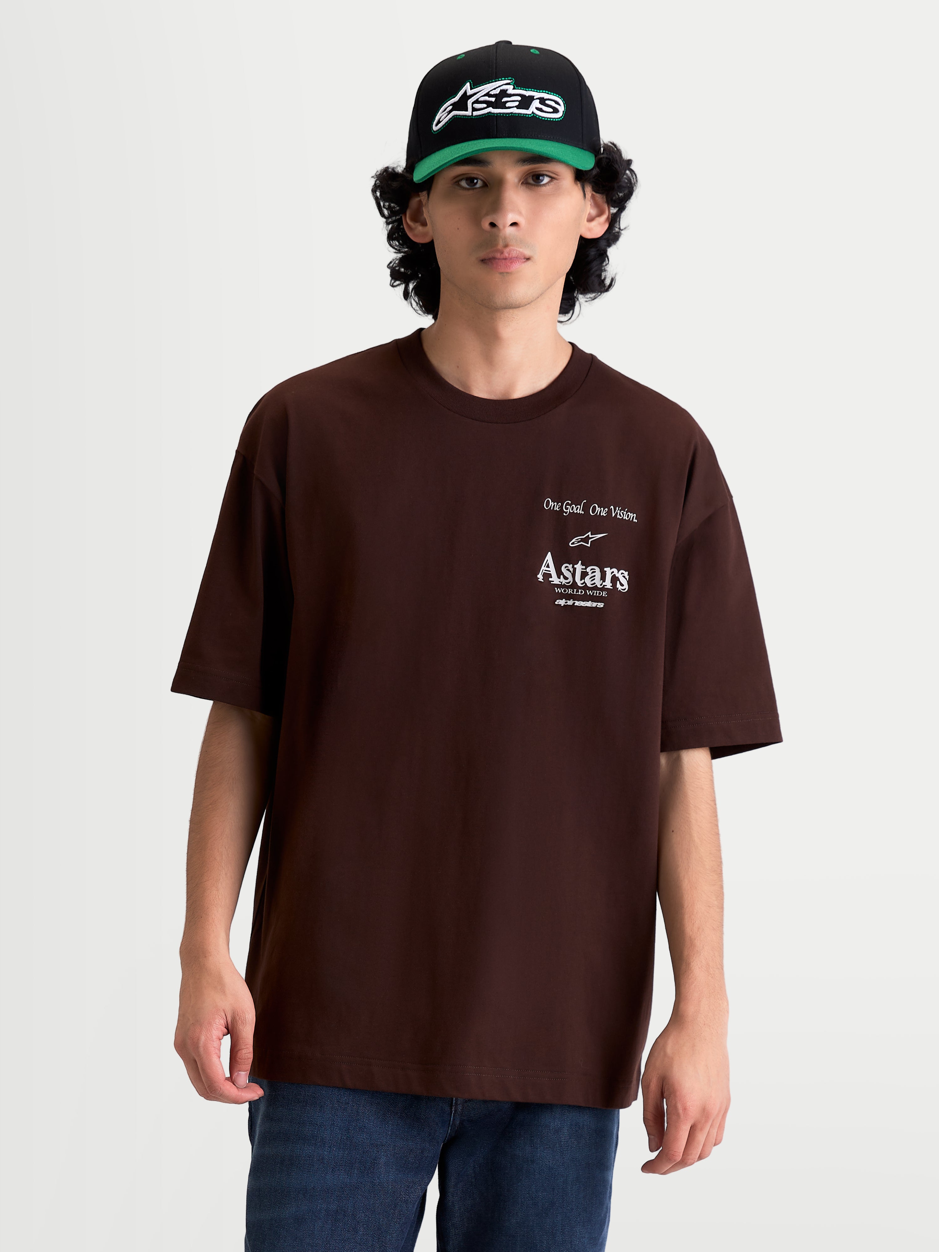 Alpinestars Post Oversized CSF Tee, Casual Sportswear Short Sleeve T-Shirt for Men and Women, Brown with White Astars Logo and One Goal One Vision Graphic, Relaxed Oversized Fit, Cotton-Poly Blend Construction.