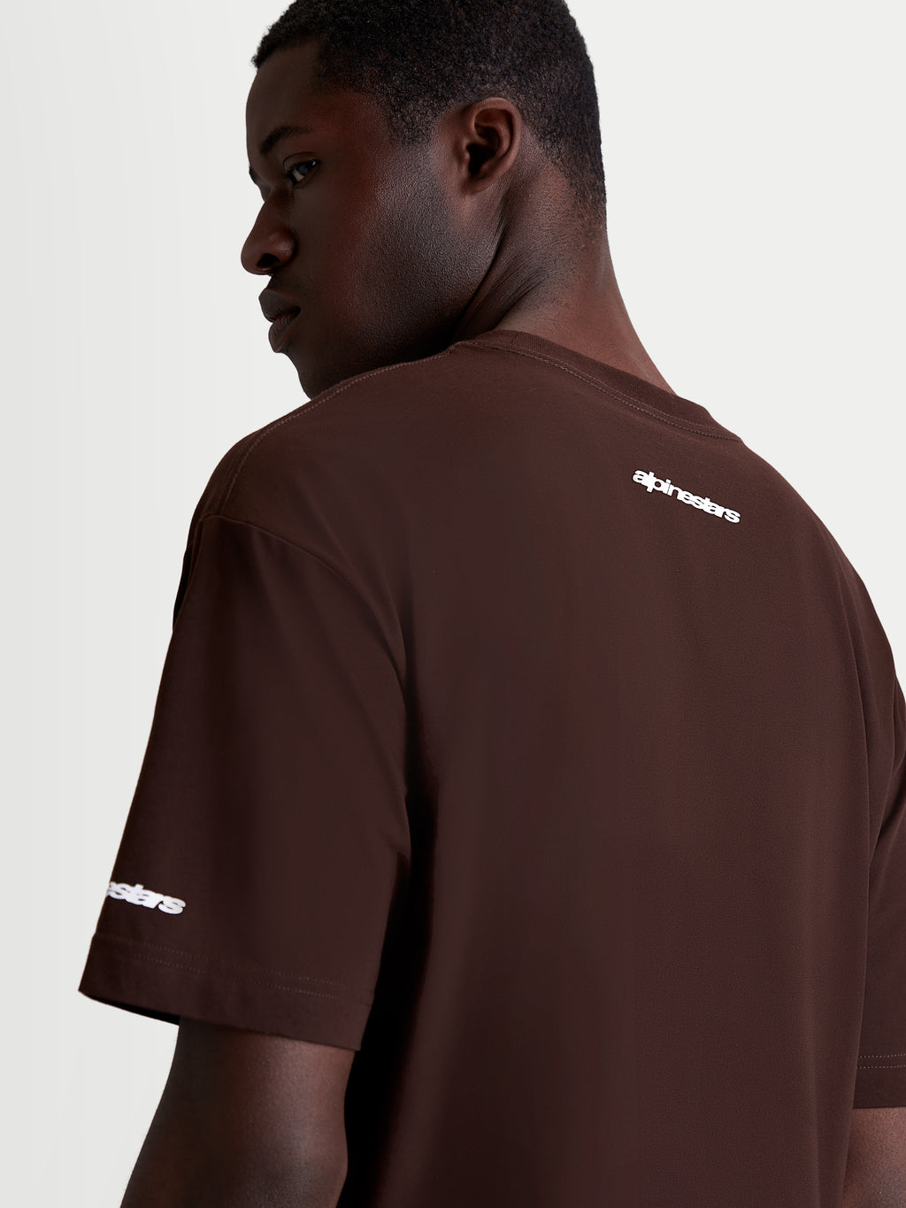Alpinestars Mandate Oversized CSF Tee, Men's Casual Sportswear T-Shirt, Brown with White puff-print logo graphics on the back shoulder and sleeve, relaxed oversized fit, soft cotton-poly blend.