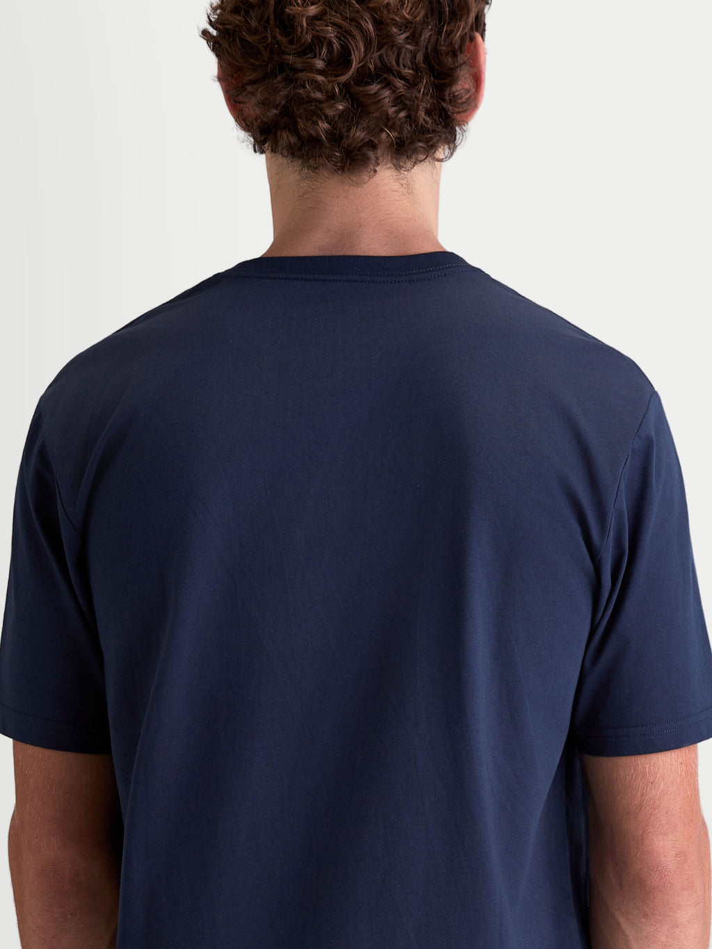 Alpinestars Cypress CSF Tee, Sportswear Short Sleeve T-Shirt for Men and Women, Navy Blue, Back View on Model, premium cotton-poly blend construction for casual everyday comfort.