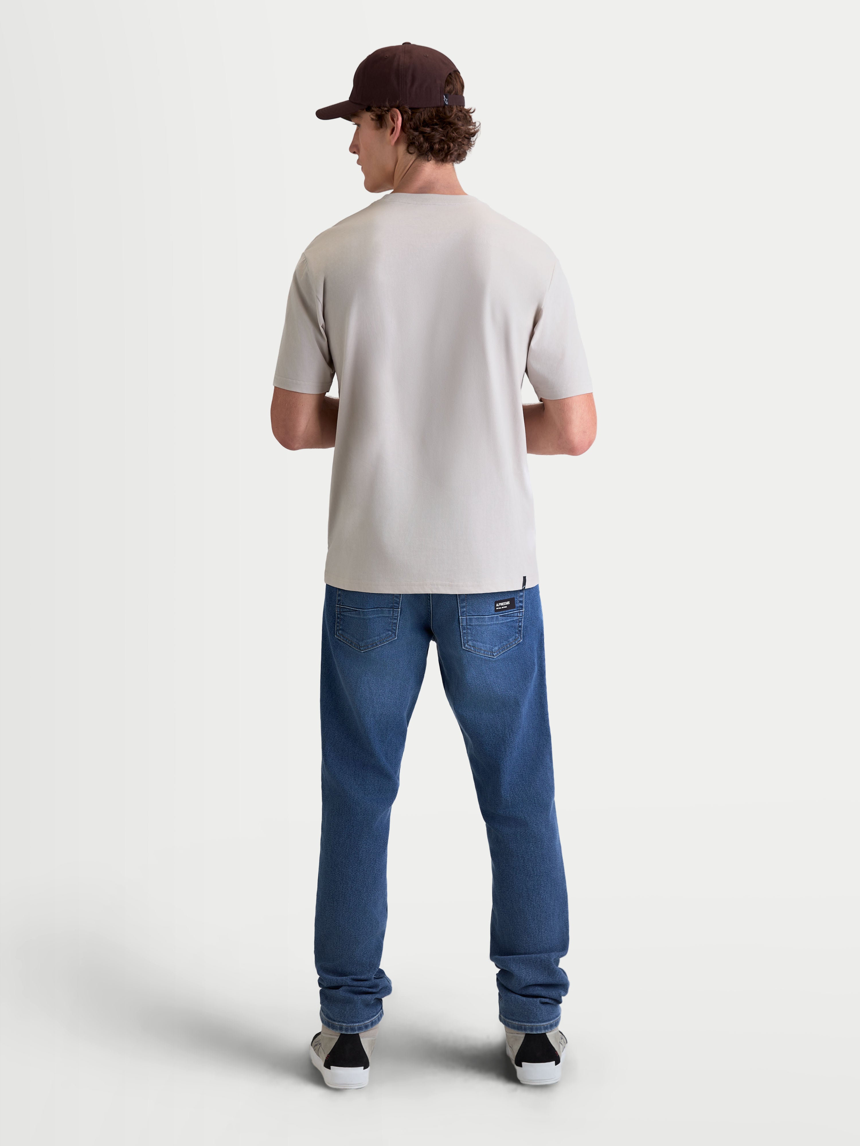 Alpinestars Elliptogrit CSF Tee, Men's Short Sleeve Sportswear T-Shirt in Cement Gray, back view on model, crafted from a premium cotton-poly blend for a casual motorsport-inspired look.