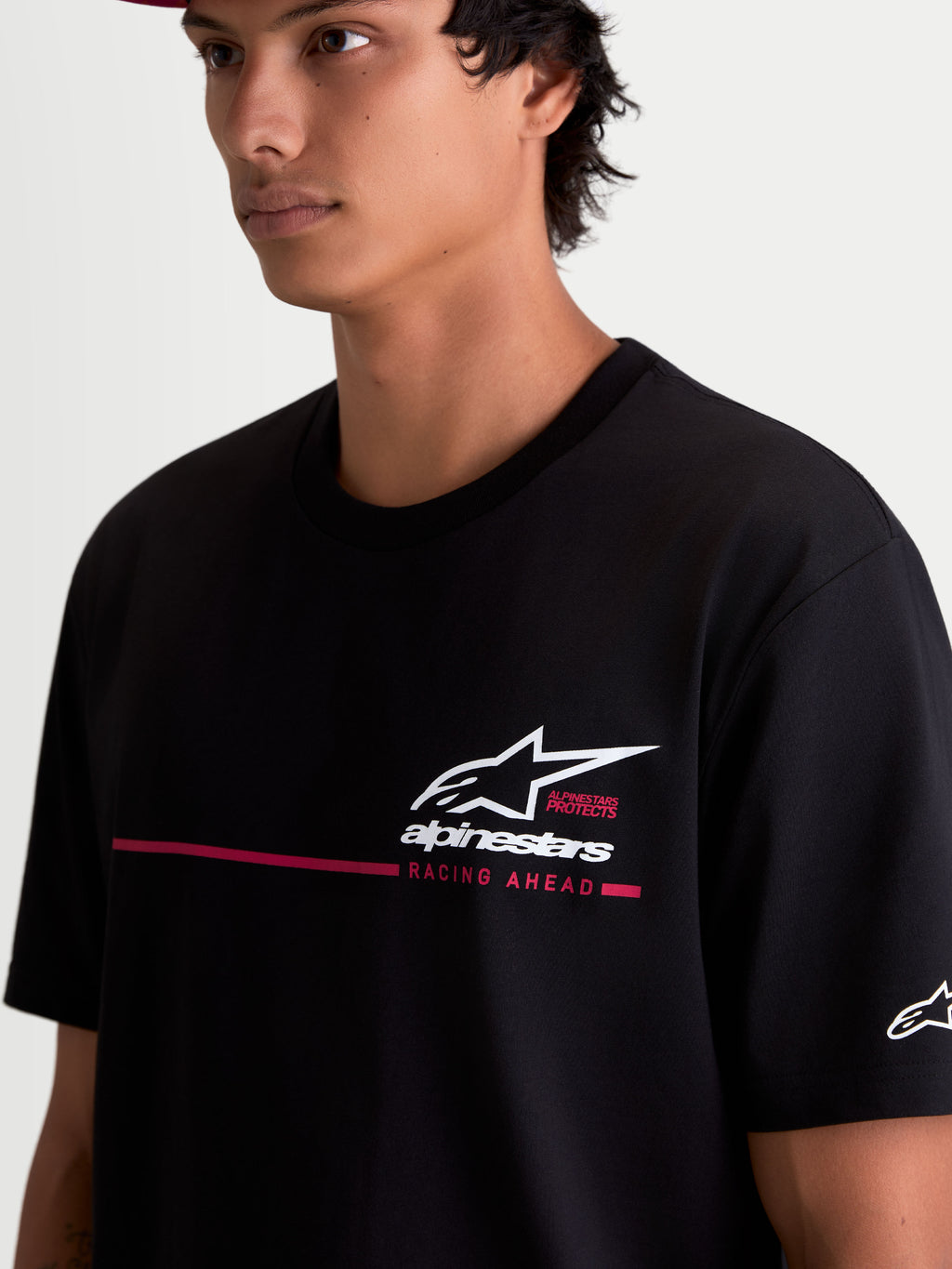 Alpinestars P1 CSF Tee, Short Sleeve Sportswear T-Shirt, Black, featuring a race stripe logo graphic with a soft-hand print finish, durable 60/40 cotton-poly blend for a casual everyday comfort.