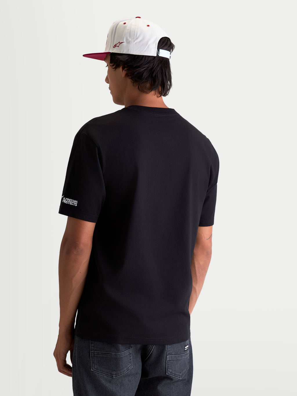 Alpinestars P1 CSF Tee, Short Sleeve Sportswear T-Shirt, Unisex, Black, featuring a front race stripe logo graphic with a soft-hand print, constructed from a comfortable cotton-poly blend for everyday motorsport style.