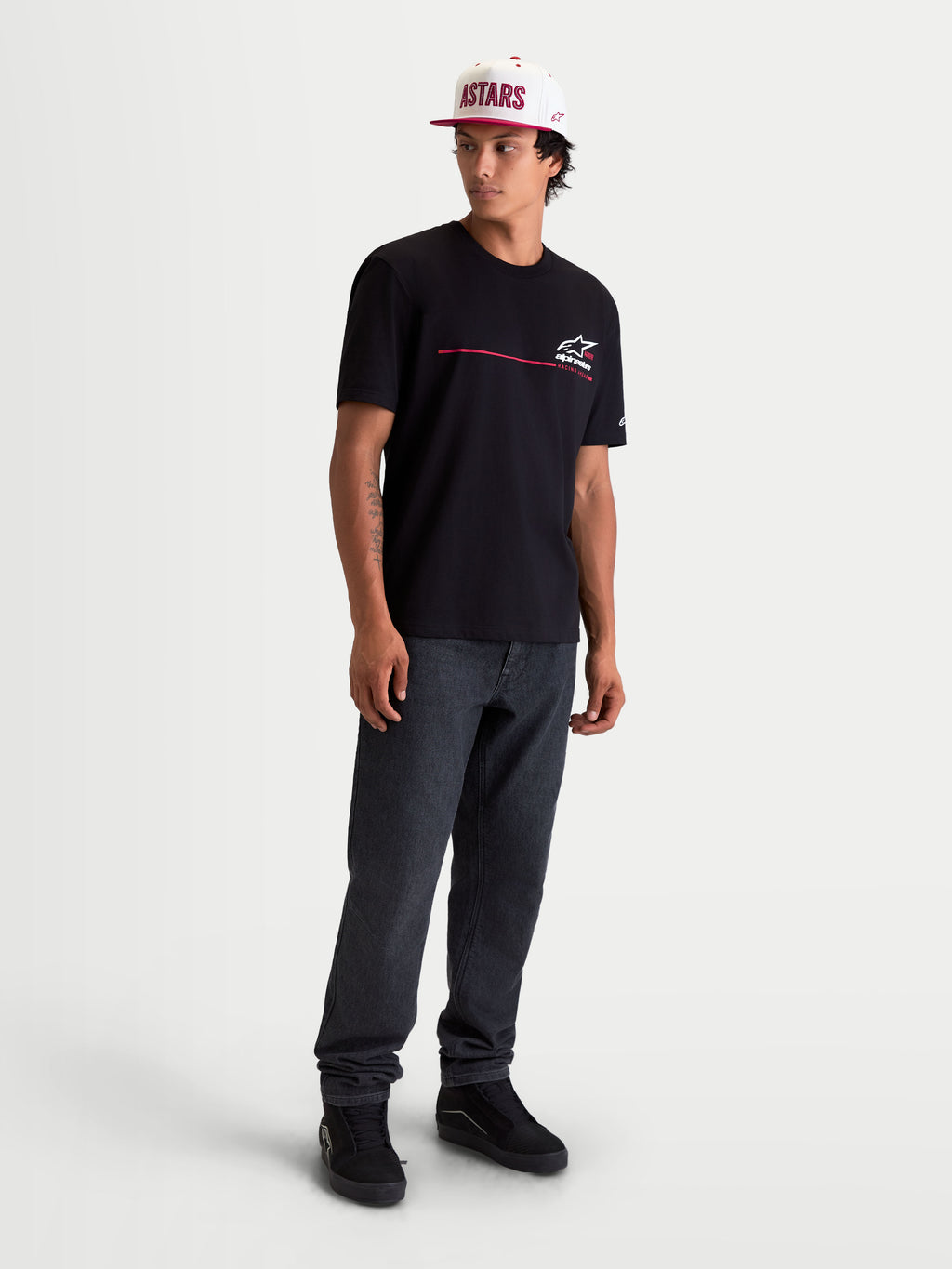 Alpinestars P1 CSF Tee, Short Sleeve Sportswear T-Shirt in Black, featuring a race stripe logo graphic with a soft-hand print finish, casual motorsport-inspired apparel for men and women.