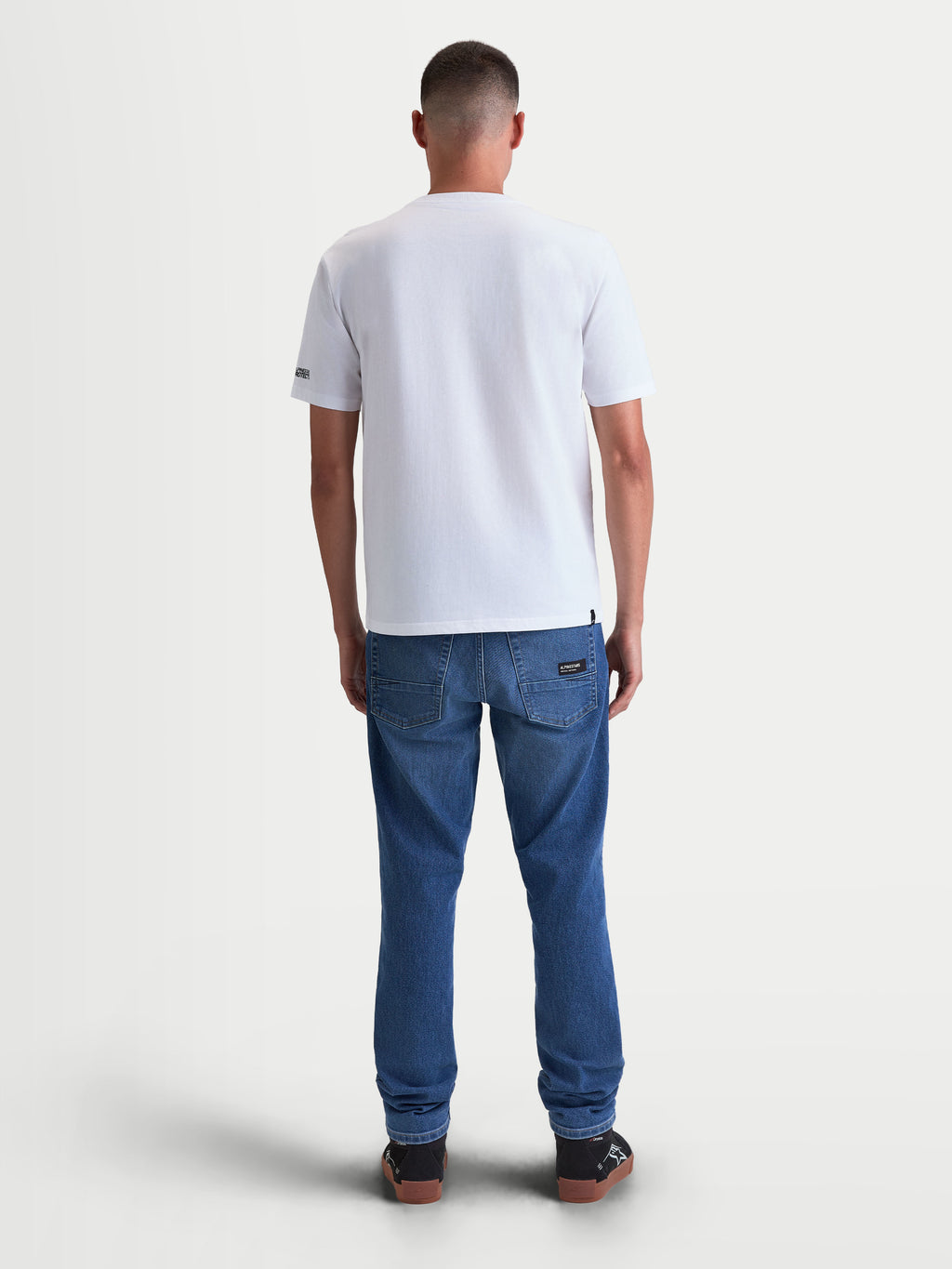 Alpinestars P1 CSF Tee, Short Sleeve Sportswear T-Shirt, Unisex, White with front Astars logo and race stripe graphic, soft cotton-poly blend, casual motorsport apparel.