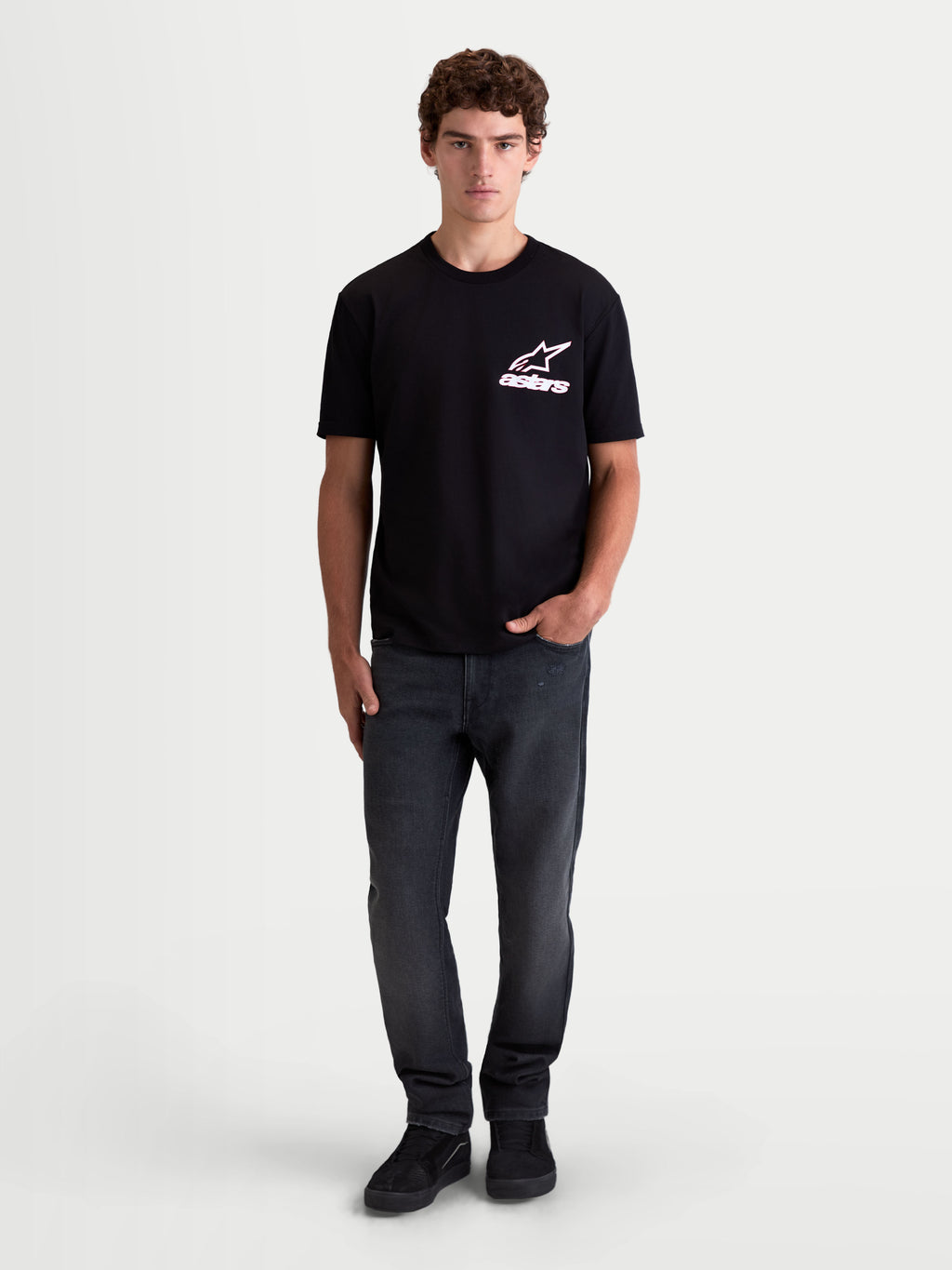 Alpinestars Lineout CSF Tee, Men's Short Sleeve Sportswear T-Shirt, Black with white and pink Astars logo graphic, on-model view, soft cotton-poly blend fabric.