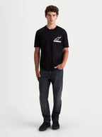 Alpinestars Lineout CSF Tee, Men's Short Sleeve Sportswear T-Shirt, Black with white and pink Astars logo graphic, on-model view, soft cotton-poly blend fabric.