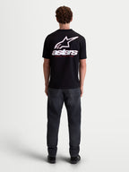 Alpinestars Lineout CSF Tee, Men's Short Sleeve Sportswear T-Shirt, Black with a large White Astars logo and 'astars' text graphic on the back, shown on model from behind, cotton-polyester blend.