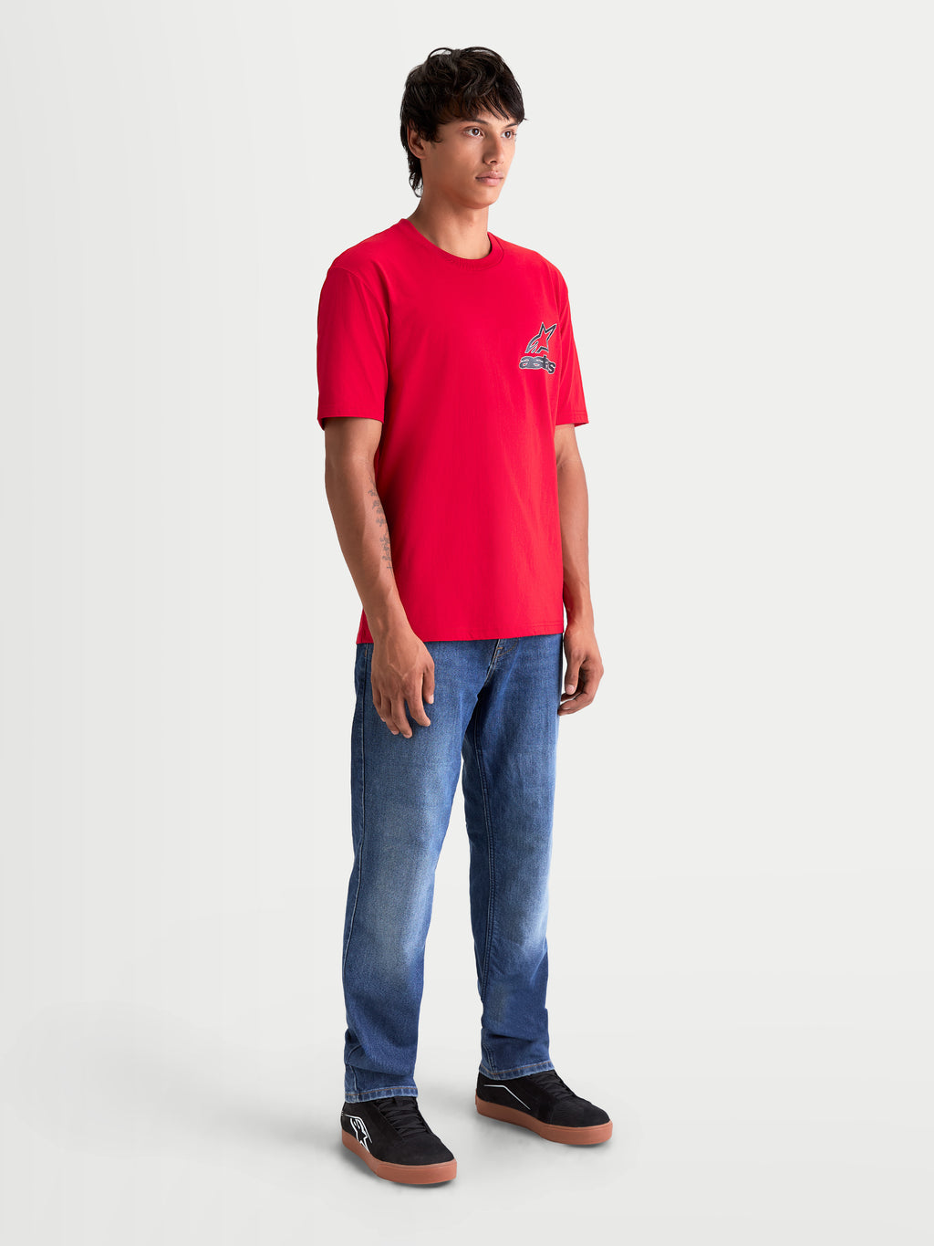 Alpinestars Lineout CSF Tee, Men's Short Sleeve Sportswear T-Shirt in Red, featuring a small Astars logo graphic on the chest, lifestyle on-model view for everyday casual wear.