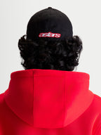 Alpinestars Lineout Hat, Sportswear Baseball Cap, Black and Red, Rear View on-model featuring embroidered astars logo, structured crown, twill fabric construction.