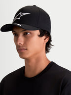 Alpinestars Arclight Hat, Sportswear Baseball Cap for Men and Women, Black and White, featuring a curved bill, structured crown, and a white textured puff-print Astars logo, shown on model.