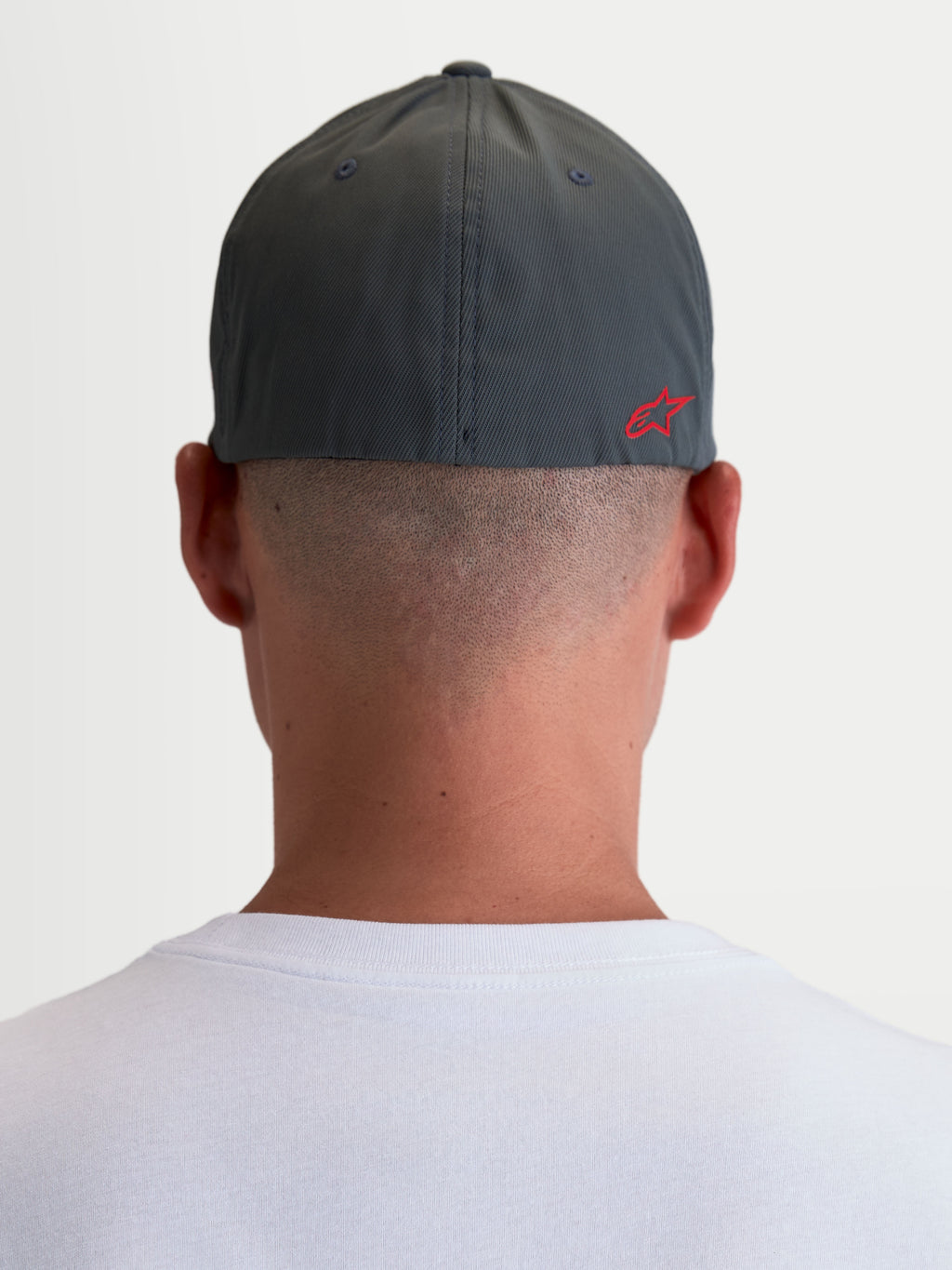 Alpinestars Points Hat, Sportswear Cap, Unisex, Dark Grey and Red, back view on-model showing the red Astars HD logo, lightweight nylon tactel with a flex-back fit.