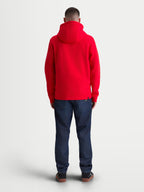 Alpinestars Ageless Zip V3 Hoodie, Red Sportswear Fleece for Men and Women, Back View on Model, featuring a comfortable hooded design with ribbed cuffs and hem, casual motorsport style.