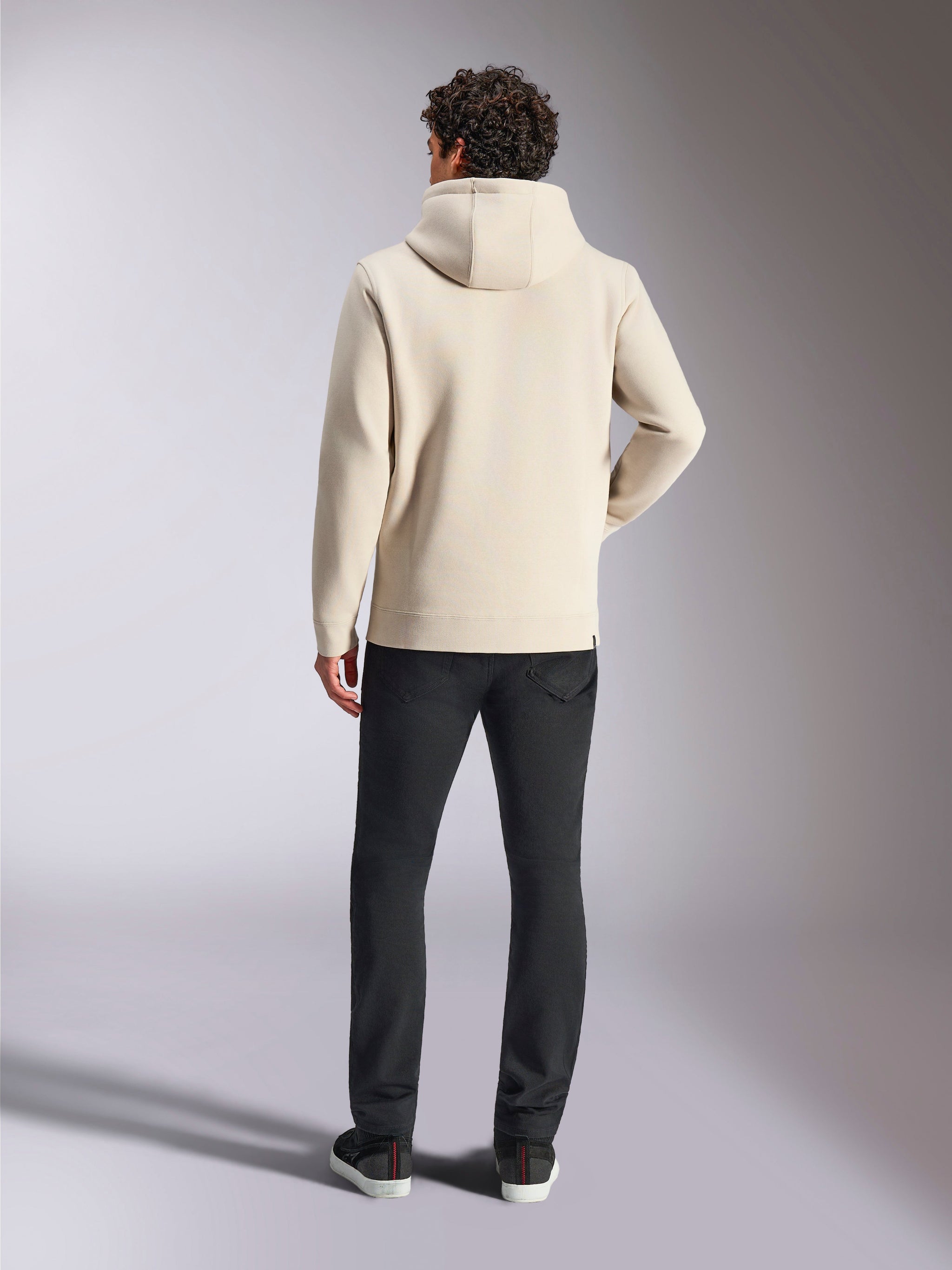 Alpinestars Always V3 Hoodie, off-white pull over fleece seen from behind, casual streetwear style with jersey-lined hood and ribbed cuffs, paired with black pants