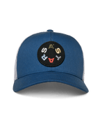 Alpinestars Gambit Trucker Hat, Blue and White, blue structured crown with curved bill and white mesh back, featuring a circular black patch with multi-colored ASTARS lettering, casual motorsport headwear