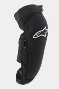 Alpinestars Vector Pro Knee/Shin Protector, Black, featuring a white Alpinestars logo on the knee, textured abrasion-resistant front panel, adjustable hook-and-loop straps, breathable MTB protection gear