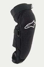 Alpinestars Vector Pro Knee/Shin Protector, Black, featuring a white Alpinestars logo on the knee, textured abrasion-resistant front panel, adjustable hook-and-loop straps, breathable MTB protection gear