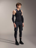 Alpinestars A-Motion Plasma Protection Vest, Sleeveless Black and Camo MTB Protection Vest, full body view of model wearing vest with arm sleeves and knee pads, zippered front with white Alpinestars logo, high-performance gear for mountain biking