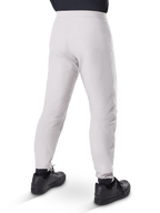 Alpinestars A-Dura Waterproof Pants, MTB Cycling Pants, Titanium Gray, rear view showing tapered legs and elasticated cuffs, worn with black shoes, waterproof technical gear for mountain biking