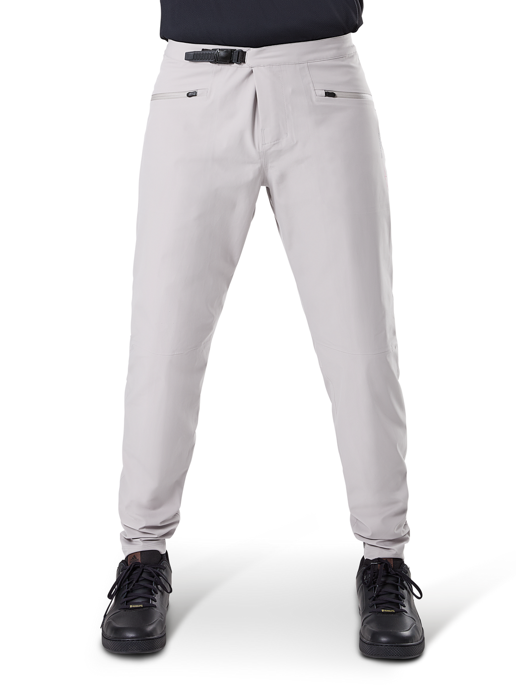 Alpinestars A-Dura Waterproof Pants, MTB Cycling Pants, Titanium Gray, front view, featuring a black ratchet waist closure and dual zippered pockets, elasticated cuffs, worn with black sneakers, technical waterproof gear for mountain biking