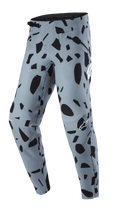 Alpinestars Techstar Envision Pants, MTB Pants, Ash Blue with black abstract pattern, featuring a ratchet waistband closure and zippered pockets, laser-perforated ventilation for breathability, designed for mountain bike riding