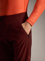 Alpinestars A-Dura Ride Shorts in Bordeaux, featuring a zippered side pocket and durable 4-way stretch MTB fabric.