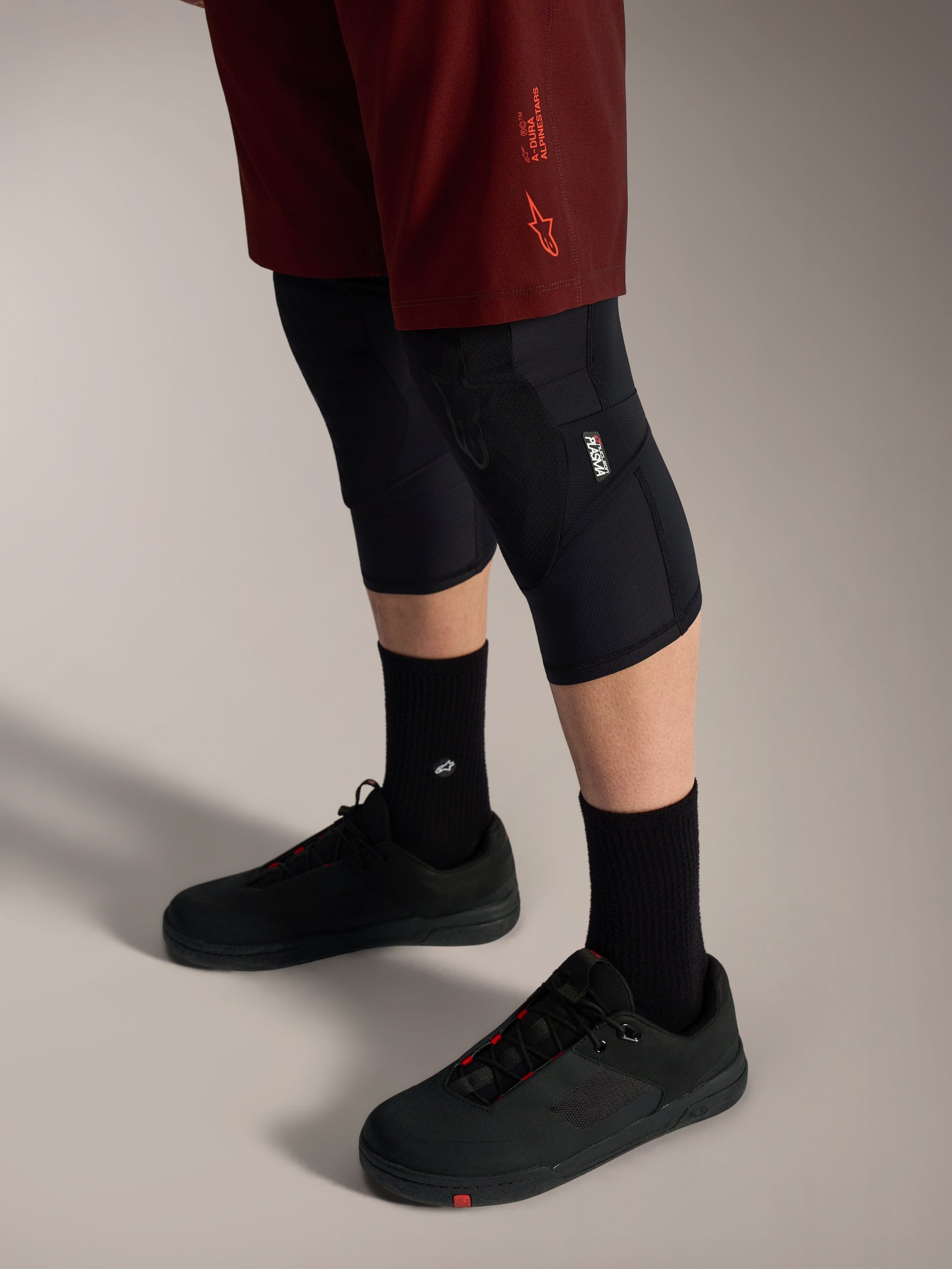 Alpinestars A-Dura Ride Shorts in Bordeaux, durable performance MTB shorts featuring a stretch fit and signature logo.