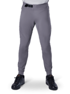 Alpinestars A-Aria Elite Pants, Mountain Bike Pants, Dark Gray, featuring laser perforations on inner thighs for ventilation and a magnetic buckle closure at the waist, performance fit with tapered legs worn with black athletic shoes