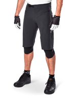 Alpinestars A-Aria Shorts, Mountain Biking Shorts, Black, knee-length with front zippered pockets and adjustable ratchet waist buckle, worn with black knee pads, socks, and cycling gloves