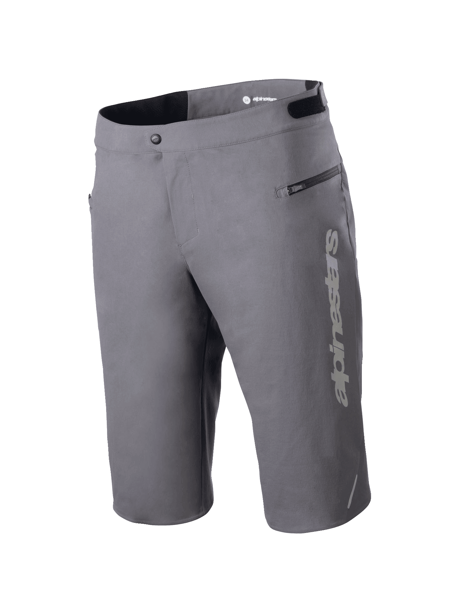Alpinestars A-Dura Elite Shorts, Mountain Bike Shorts, Dark Gray, featuring a vertical Alpinestars logo on the leg, zippered side pocket, front snap closure, and adjustable waist tabs for off-road cycling.