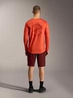 Orange A-Dura Air LS Jersey paired with Bordeaux Ride Shorts, rear view of performance Alpinestars MTB apparel.