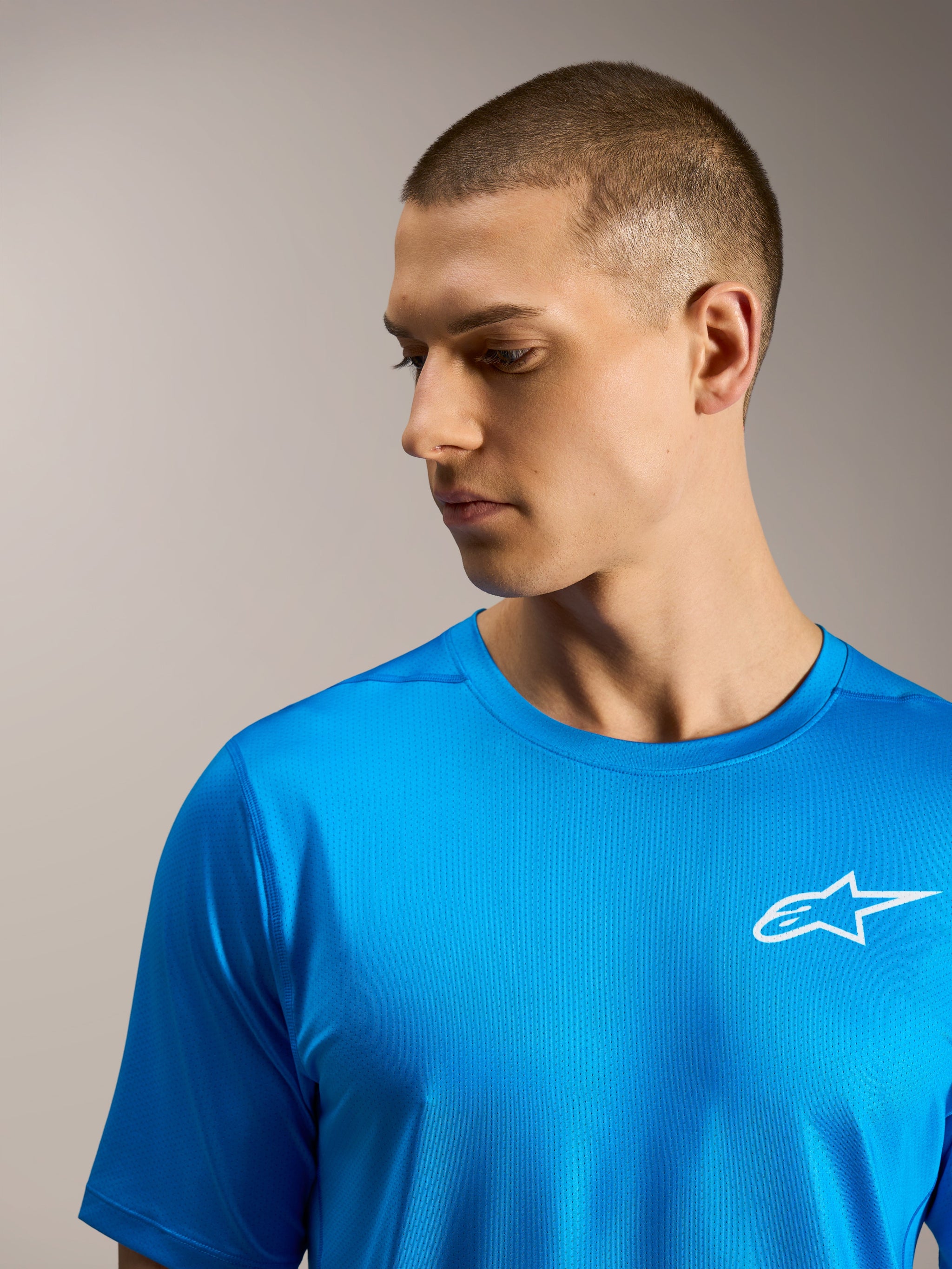 Alpinestars A-Dura Air Jersey, bright blue short sleeve MTB top in breathable jacquard mesh with white chest logo.
