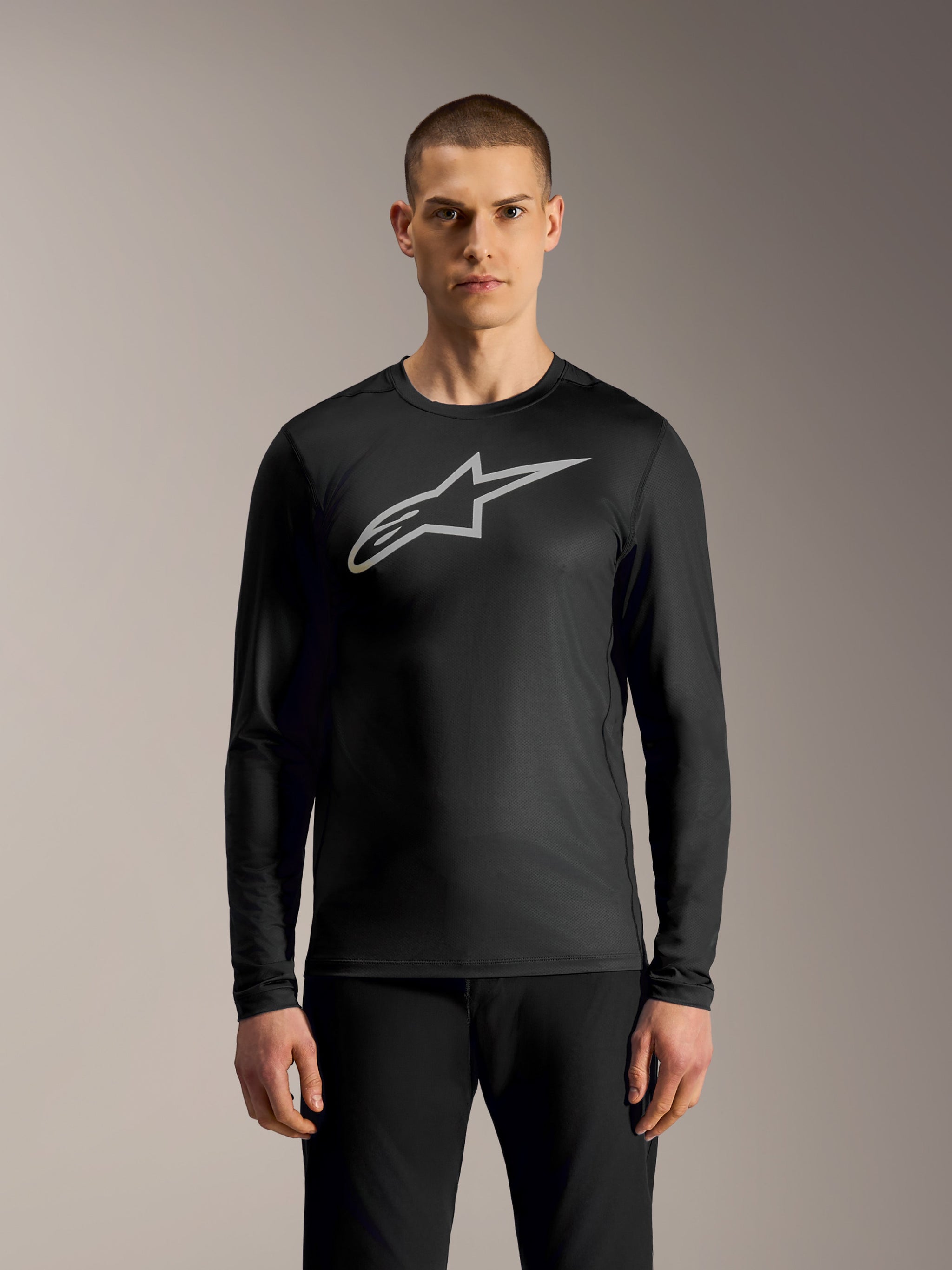 Black A-Dura Ride Long Sleeve Jersey featuring a silver Astars logo, performance mountain bike apparel.