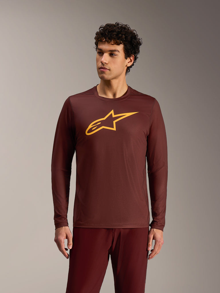 A-Dura Ride Long Sleeve Jersey in Bordeaux, yellow Alpinestars chest logo, performance poly-blend mountain bike apparel.