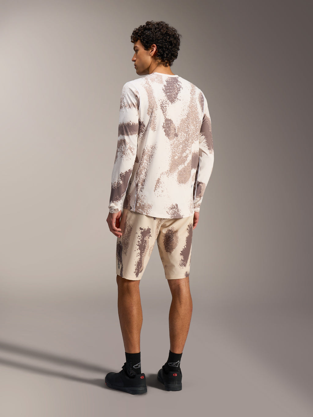 A-Dura Ride LS Jersey and matching Shorts in Sand Camo, technical mountain bike gear with a textured camouflage pattern.