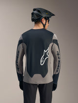 A-Dura Race Long Sleeve Jersey in gray and black, featuring bold white Alpinestars logos on the back and sleeves.