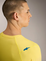 Yellow fluo A-Dura ASTARS Jersey 2.0, back view showing blue shoulder logo and breathable jacquard MTB fabric.