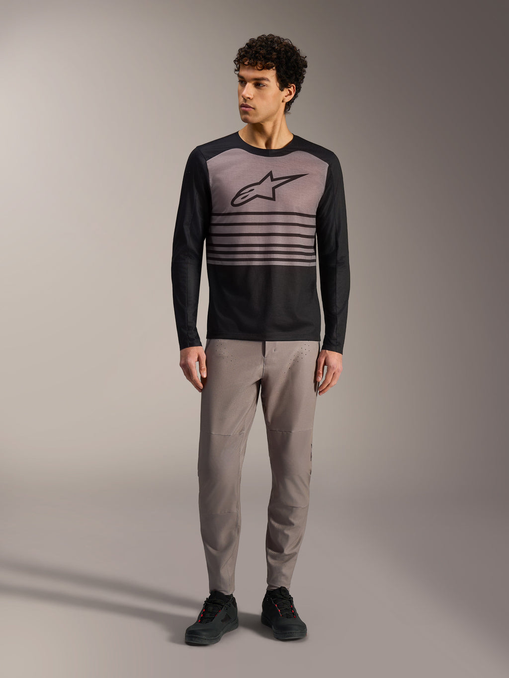 Alpinestars A-Dura Elite Jersey 2.0, long sleeve black and grey MTB jersey with chest logo and stripe details.