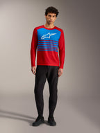 A-Dura Elite Jersey 2.0, red long sleeve MTB top with blue chest panel, white Alpinestars logo, and striped accents.