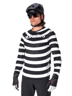 Alpinestars A-Aria Oscar Long Sleeve Jersey, MTB cycling jersey, Black and white horizontal stripes, worn with a black helmet and sunglasses, featuring Alpinestars branding on the chest, performance mountain bike apparel